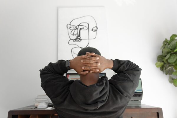 Man with hands on his head